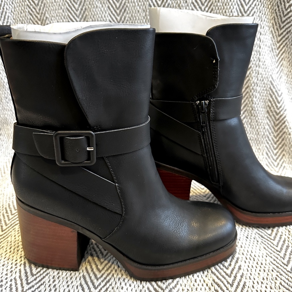Black ankle boots with inside zipper and outside buckle. NBW. Women’s Size 7.
